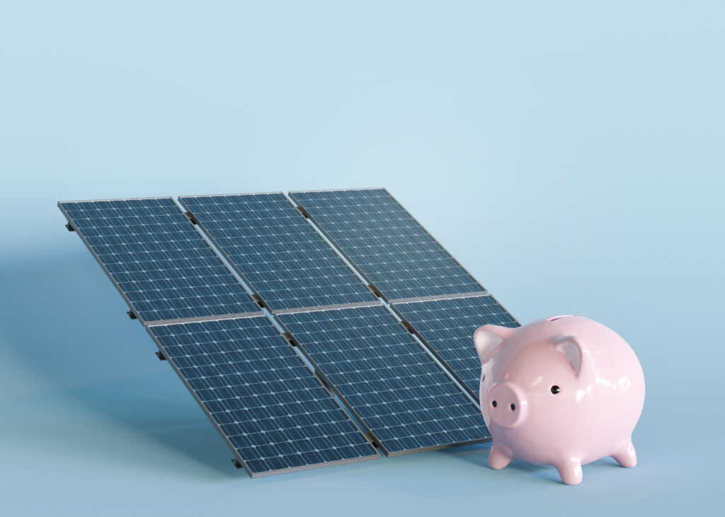 Solar panels and piggy bank on blue background. Photovoltaic, alternative electricity source. Sustainable resources. Free, copy space for your text, advertising. Energy crisis. 3D rendering